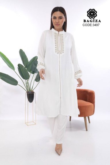  This plus-size white dress stands out with its elegant and sophisticated design. Made from a fabric that is 95% cotton and 5% Lycra, it provides a comfortable wear. The delicate embroideries on the front and sleeve details add a unique flair to the dress. Available in sizes 42, 44, 46, and 48. Its lightweight and breathable fabric ensures a comfortable experience during the summer months.