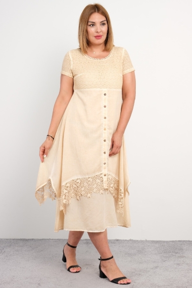  For plus size women, a beige colored, long dress made of delicate and elegant thin fabric with front button detail and short sleeves.