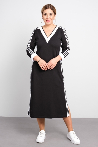  This Plus Size Womens Casual Dress features a long-sleeve and V-neck design. The black dress is adorned with white stripe details on the sides and sleeves. Made from high-quality fabric, it offers a comfortable and stylish wear. It can be paired with sneakers for a casual look in daily life.
